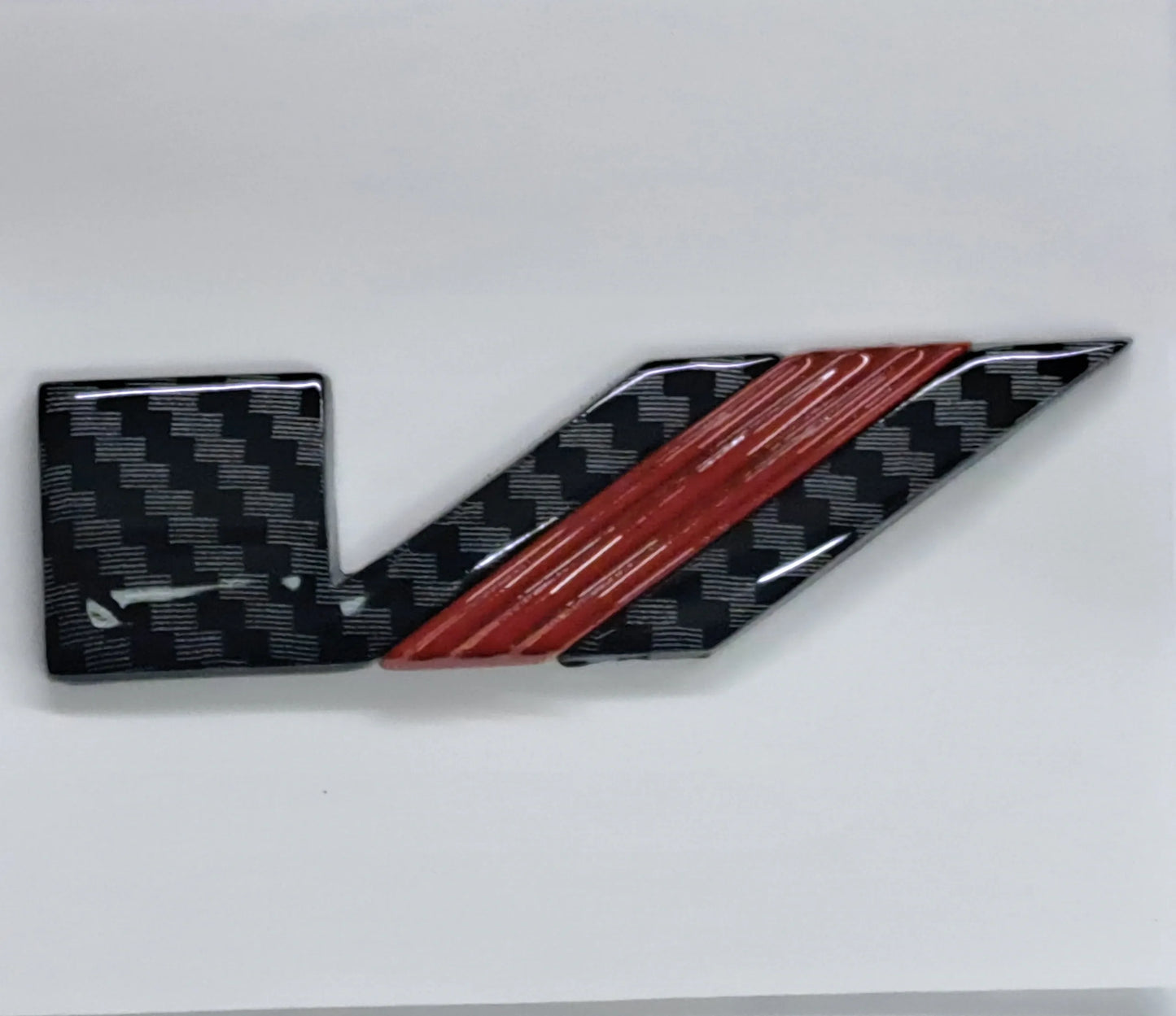 Carbon Fiber Print w/Red "V-Sport" Badge
