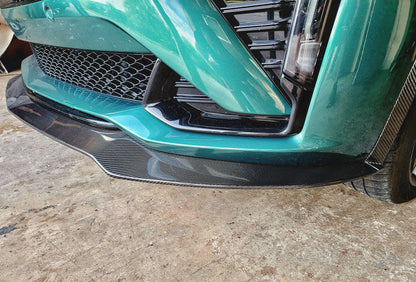 Cadillac 2025 2026 CT5-V CT5V front chin lip front splitter in Carbon Fiber or Gloss Black Fiberglass. OEM + American Aftermarket Upgrade Mods