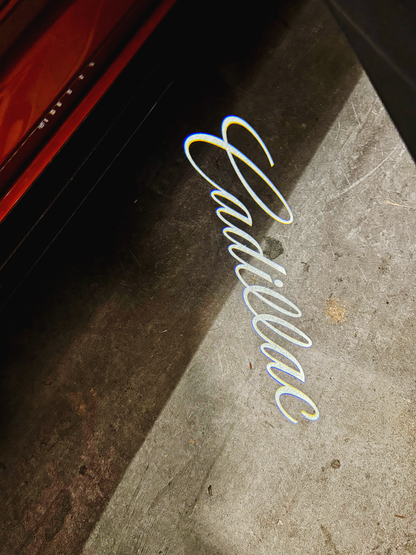 Courtesy Door Puddle Lights "Cadillac Script" Logo