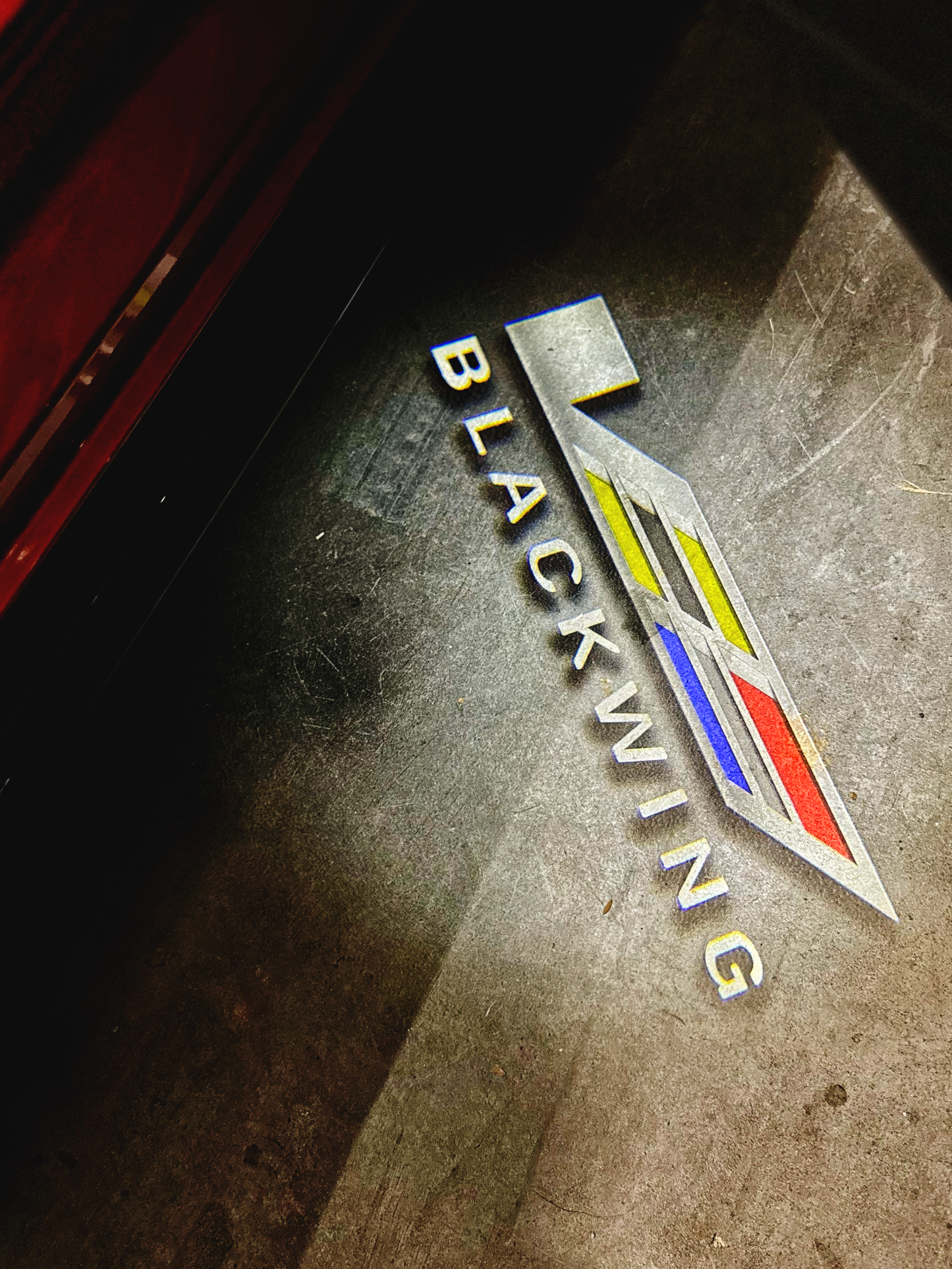 Courtesy Door Puddle Lights Colored "V-Series & Blackwing Script" Logo