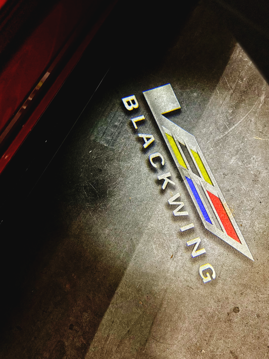 Courtesy Door Puddle Lights Colored "V-Series & Blackwing Script" Logo