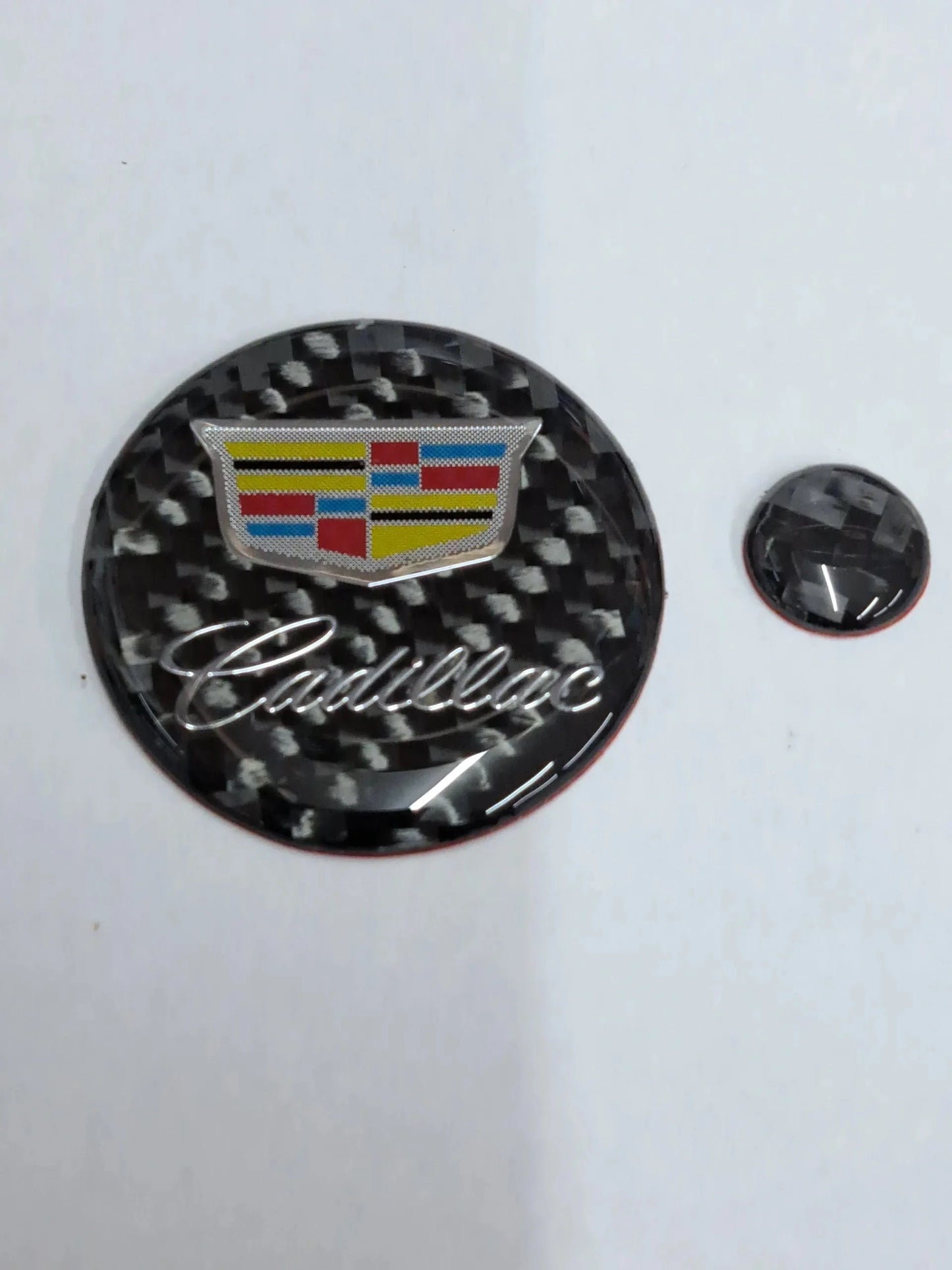 Cadillac CT4 Center Console Media Knobs Trim with "Shield and Script" Logo